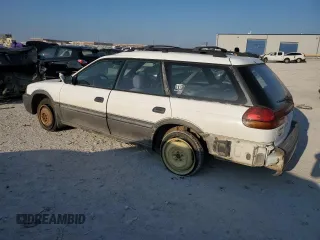 1996 Subaru Legacy Outback with VIN 4S3BG6857T7386841, listed as a Copart auction lot 70968724 with 122,232 mi miles and Salvage title. Bid and sale history available at DreamBid. Image 2.