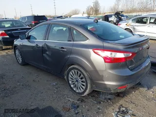 2012 Ford Focus Titanium with VIN 1FAHP3J2XCL421412, listed as a IAAI auction lot 41721565 with 117,632 mi miles. Bid and sale history available at carsss.com. Image 3.