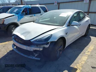 2022 Tesla Model 3 with VIN 5YJ3E1EA7NF103513, listed as a IAAI auction lot 41643592 with 35,631 mi miles and . Bid and sale history available at DreamBid. Image 23.