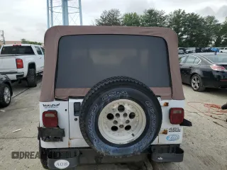 1993 Jeep Wrangler z VIN 1J4FY29S6PP245917, wystawiony jako Copart lot #58805235 z przebiegiem 162 170 mil mil oraz Czysty tytuł • Clean title. Historia ofert i sprzedaży dostępna na DreamBid. Obrazek 6.