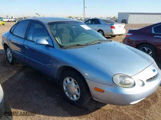 1997 Ford Taurus GL with VIN 1FALP52U9VA146975, listed as a IAAI auction lot 41816224 with 110,996 mi miles. Bid and sale history available at carsss.com. Image 1.