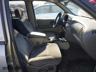 2003 Chevrolet TrailBlazer LS with VIN 1GNDT13SX32271126, listed as a IAAI auction lot 41760397 with 242,715 mi miles. Bid and sale history available at carsss.com. Image 5.