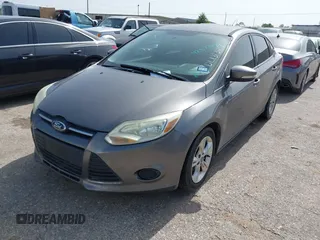 2013 Ford Focus SE with VIN 1FADP3F23DL131327, listed as a IAAI auction lot 42577474 with 146,412 mi miles and . Bid and sale history available at DreamBid. Image 2.
