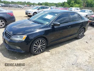 2016 Volkswagen Jetta Sport z VIN 3VWD17AJ2GM232702, wystawiony jako IAAI lot #42399962 z przebiegiem 175 038 mil mil oraz . Historia ofert i sprzedaży dostępna na DreamBid. Obrazek 17.