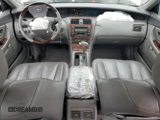 2004 Toyota Avalon XL z VIN 4T1BF28B94U380488, wystawiony jako Copart lot #57809445 z przebiegiem 103 078 mil mil oraz Szkoda całkowita • Salvage title. Historia ofert i sprzedaży dostępna na DreamBid. Obrazek 8.