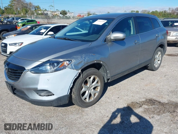 2013 Mazda CX-9 Sport with VIN JM3TB3BA4D0406522, listed as a IAAI auction lot 41662220 with 169,262 mi miles and . Bid and sale history available at carsss.com. Image 2.