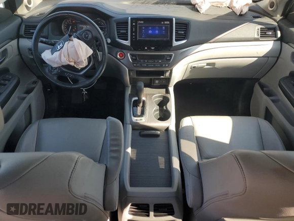 2016 Honda Pilot EX-L with VIN 5FNYF6H51GB007135, listed as a Copart auction lot 52606045 with 99,622 mi miles and Salvage Title. Bid and sale history available at DreamBid. Image 8.