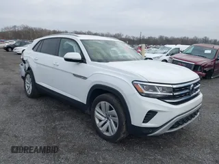 2022 Volkswagen Atlas SE z VIN 1V2HE2CA9NC221542, wystawiony jako IAAI lot #41088516 z przebiegiem 26 124 mil mil oraz . Historia ofert i sprzedaży dostępna na DreamBid. Obrazek 1.