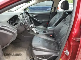 2014 Ford Focus Titanium with VIN 1FADP3J20EL352909, listed as a Copart auction lot 58501085 with 174,388 mi miles and Salvage title. Bid and sale history available at DreamBid. Image 7.