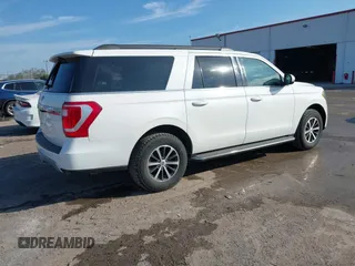 2021 Ford Expedition Max XLT with VIN 1FMJK1JT3MEA38310, listed as a IAAI auction lot 41511993 with 64,786 mi miles and . Bid and sale history available at DreamBid. Image 4.