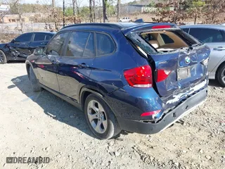 2013 BMW X1 28i with VIN WBAVM1C52DVW46153, listed as a IAAI auction lot 41236419 with 160,732 mi miles. Bid and sale history available at carsss.com. Image 3.
