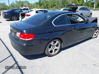 2010 BMW 3 Series 328i with VIN WBAWV1C58AP124385, listed as a IAAI auction lot 41761958 with 197,944 mi miles. Bid and sale history available at carsss.com. Image 4.