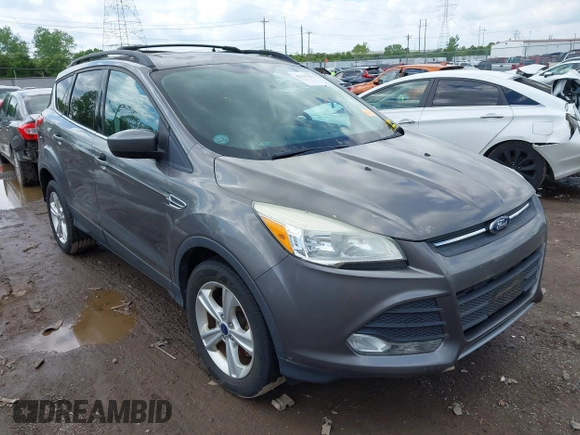 2013 Ford Escape SE with VIN 1FMCU9GX3DUD35255, listed as a IAAI auction lot 42197543 with 154,359 mi miles and . Bid and sale history available at DreamBid. Image 1.