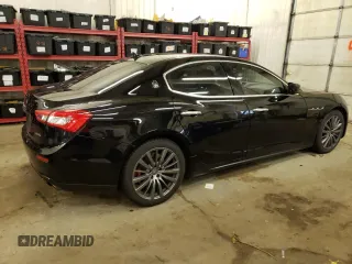 2016 Maserati Ghibli S Q4 with VIN ZAM57RTA3G1171304, listed as a Copart auction lot 69976983 with 97,099 mi miles. Bid and sale history available at carsss.com. Image 3.