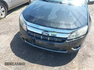 2011 Ford Fusion SE with VIN 3FAHP0HA6BR153888, listed as a IAAI auction lot 42009992 with 213,676 mi miles. Bid and sale history available at carsss.com. Image 6.