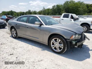 2011 Dodge Charger RT Max with VIN 2B3CM5CT7BH572445, listed as a Copart auction lot 66782634 with 129,743 mi miles and Salvage Title. Bid and sale history available at carsss.com. Image 4.