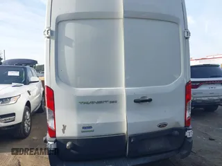 2017 Ford Transit Cargo with VIN 1FTBW3XG9HKA80524, listed as a IAAI auction lot 37520715 with 98,524 mi miles. Bid and sale history available at carsss.com. Image 16.