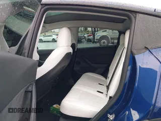 2022 Tesla Model Y Long Range with VIN 7SAYGDEE7NF409294, listed as a IAAI auction lot 41845261 with 73,116 mi miles and . Bid and sale history available at DreamBid. Image 8.