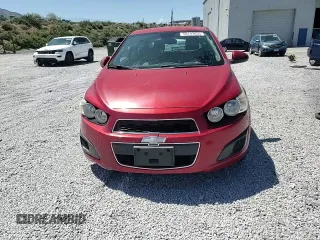 2012 Chevrolet Sonic LS z VIN 1G1JA6SH0C4113041, wystawiony jako Copart lot #58743055 z przebiegiem 69 453 mil mil oraz Szkoda całkowita • Salvage title. Historia ofert i sprzedaży dostępna na DreamBid. Obrazek 14.