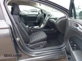 2016 Ford Fusion SE Hybrid with VIN 3FA6P0LU5GR235241, listed as a IAAI auction lot 41697504 with 165,510 mi miles. Bid and sale history available at carsss.com. Image 5.