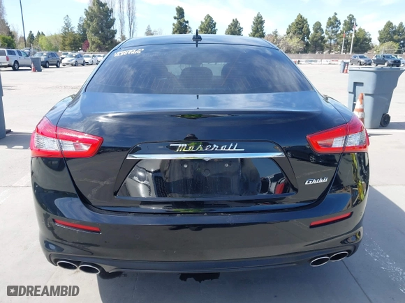 2019 Maserati Ghibli with VIN ZAM57XSA5K1328183, listed as a IAAI auction lot 41970101 with 61,260 mi miles. Bid and sale history available at carsss.com. Image 16.