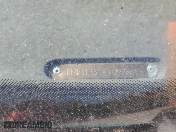 2000 Hyundai Elantra GLS z VIN KMHJF35FXYU998689, wystawiony jako Copart lot #76181814 z przebiegiem 154 743 mil mil oraz Szkoda całkowita • Salvage title. Historia ofert i sprzedaży dostępna na DreamBid. Obrazek 12.
