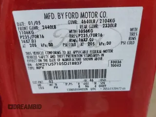 2005 Mercury Mariner Luxury z VIN 4M2YU57105DJ18837, wystawiony jako Copart lot #52105545 z przebiegiem 177 049 mil mil oraz Szkoda całkowita • Salvage title. Historia ofert i sprzedaży dostępna na DreamBid. Obrazek 15.