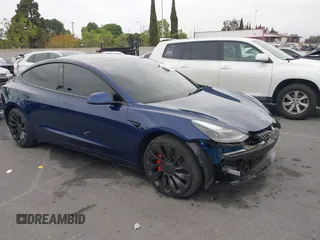 2023 Tesla Model 3 Performance z VIN 5YJ3E1EC7PF625885, wystawiony jako IAAI lot #42109227 z przebiegiem 25 943 mil mil oraz . Historia ofert i sprzedaży dostępna na DreamBid. Obrazek 1.