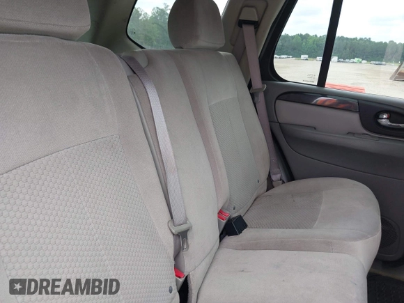 2007 GMC Envoy SLE with VIN 1GKDS13S572174308, listed as a IAAI auction lot 42211372 with 212,377 mi miles and . Bid and sale history available at DreamBid. Image 8.