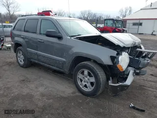 2007 Jeep Grand Cherokee Laredo with VIN 1J8GR48K57C556517, listed as a IAAI auction lot 41534166 with 158,914 mi miles. Bid and sale history available at carsss.com. Image 1.