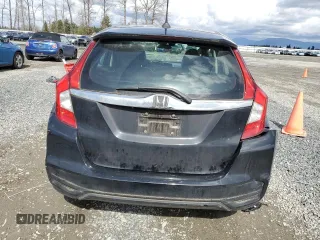 2018 Honda Fit EX-L with VIN 3HGGK5H99JM700706, listed as a Copart auction lot 50999845 with 74,985 mi miles and Salvage title. Bid and sale history available at DreamBid. Image 6.