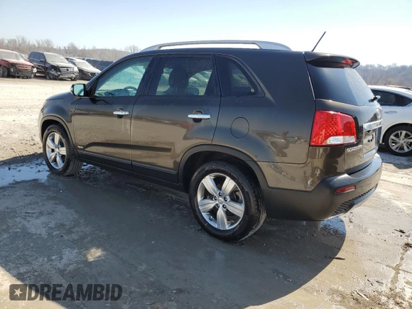 2012 Kia Sorento EX with VIN 5XYKUDA22CG201112, listed as a Copart auction lot 48316305 with 181,177 mi miles and Salvage Title. Bid and sale history available at carsss.com. Image 2.