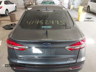 2020 Ford Fusion SE z VIN 3FA6P0LU4LR118809, wystawiony jako IAAI lot #41952995 z przebiegiem 35 353 mil mil oraz . Historia ofert i sprzedaży dostępna na DreamBid. Obrazek 17.
