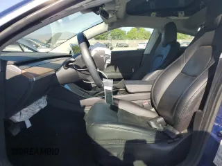 2019 Tesla Model 3 Mid Range z VIN 5YJ3E1EAXKF299345, wystawiony jako Copart lot #58335555 z przebiegiem 69 372 mil mil oraz Szkody całkowita. Historia ofert i sprzedaży dostępna na DreamBid. Obrazek 7.