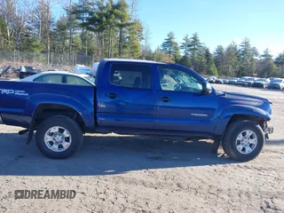 2014 Toyota Tacoma with VIN 3TMLU4EN5EM140028, listed as a IAAI auction lot 40965372 with 94,372 mi miles and . Bid and sale history available at DreamBid. Image 14.