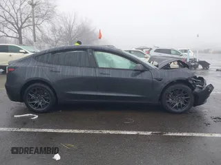 2024 Tesla Model 3 Long Range with VIN 5YJ3E1EB2RF815376, listed as a IAAI auction lot 41565549 with 10,377 mi miles and . Bid and sale history available at DreamBid. Image 12.