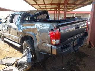 2017 Toyota Tacoma SR5 with VIN 3TMCZ5AN7HM104214, listed as a IAAI auction lot 41619808 with 48,236 mi miles and . Bid and sale history available at carsss.com. Image 3.