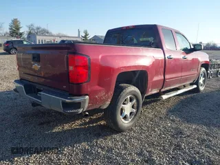 2015 Chevrolet Silverado 1500 LT with VIN 1GCRCREC2FZ354466, listed as a IAAI auction lot 41751329 with 134,690 mi miles. Bid and sale history available at carsss.com. Image 4.
