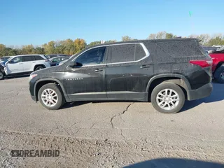 2019 Chevrolet Traverse LS with VIN 1GNERFKWXKJ198719, listed as a IAAI auction lot 40668986 with 99,917 mi miles. Bid and sale history available at carsss.com. Image 14.