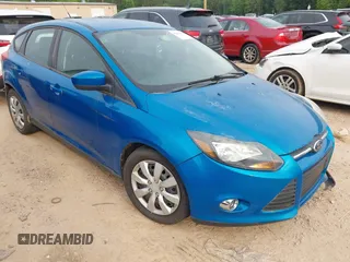 2012 Ford Focus SE z VIN 1FAHP3K20CL265296, wystawiony jako IAAI lot #42250262 z przebiegiem 239 443 mil mil oraz . Historia ofert i sprzedaży dostępna na DreamBid. Obrazek 1.