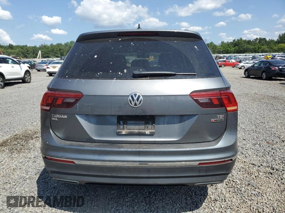 2018 Volkswagen Tiguan SEL z VIN 3VV2B7AX5JM065899, wystawiony jako Copart lot #65825635 z przebiegiem 115 677 mil mil oraz Szkoda całkowita • Salvage title. Historia ofert i sprzedaży dostępna na DreamBid. Obrazek 6.