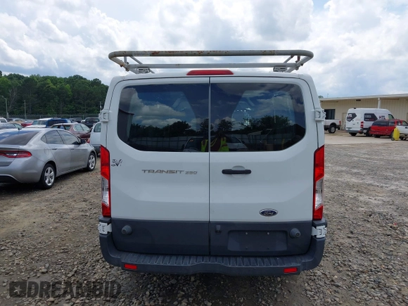 2016 Ford Transit Cargo z VIN 1FTYR2ZM9GKB01756, wystawiony jako IAAI lot #42469442 z przebiegiem 180 944 mil mil oraz . Historia ofert i sprzedaży dostępna na DreamBid. Obrazek 16.