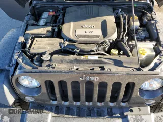 2016 Jeep Wrangler Willys Wheeler with VIN 1C4AJWAG5GL266235, listed as a Copart auction lot 50237195 with 60,830 mi miles and Salvage title. Bid and sale history available at DreamBid. Image 11.