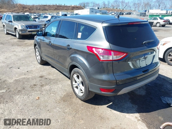 2016 Ford Escape SE with VIN 1FMCU9GX7GUA58243, listed as a IAAI auction lot 41856764 with 50,129 mi miles and . Bid and sale history available at DreamBid. Image 3.