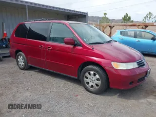 2003 Honda Odyssey EX with VIN 5FNRL18643B086576, listed as a IAAI auction lot 41991328 with 130,025 mi miles and . Bid and sale history available at carsss.com. Image 1.