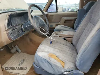 1989 Ford Bronco XL z VIN 1FMEU15N6KLA87551, wystawiony jako Copart lot #56662825 z przebiegiem 87 257 mil mil oraz Czysty tytuł • Clean title. Historia ofert i sprzedaży dostępna na DreamBid. Obrazek 7.