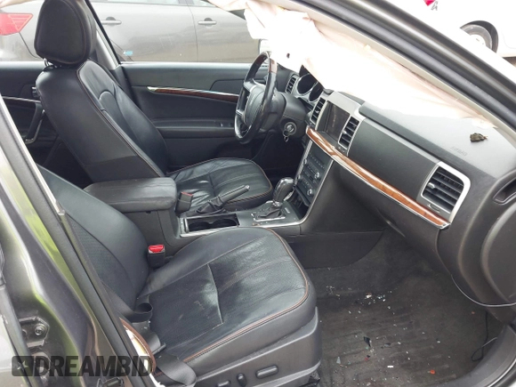 2012 Lincoln MKZ with VIN 3LNHL2JC0CR800294, listed as a IAAI auction lot 42423361 with 101,579 mi miles and . Bid and sale history available at DreamBid. Image 5.