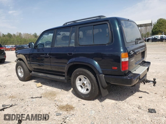 1995 Toyota Land Cruiser z VIN JT3DJ81W9S0112464, wystawiony jako Copart lot #49925395 z przebiegiem 215 698 mil mil oraz Czysty tytuł • Clean title. Historia ofert i sprzedaży dostępna na DreamBid. Obrazek 2.