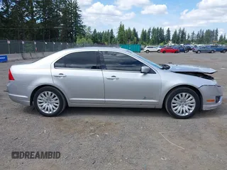2012 Ford Fusion Hybrid with VIN 3FADP0L35CR440051, listed as a IAAI auction lot 42644284 with 89,087 mi miles and . Bid and sale history available at DreamBid. Image 13.