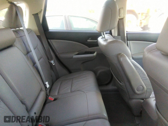 2012 Honda CR-V EX-L with VIN JHLRM4H70CC021165, listed as a IAAI auction lot 42023012 with 147,603 mi miles and . Bid and sale history available at DreamBid. Image 8.